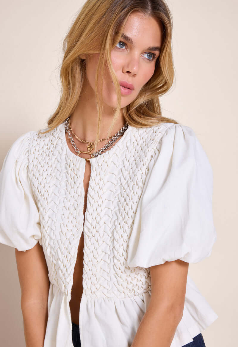 Top Corinne